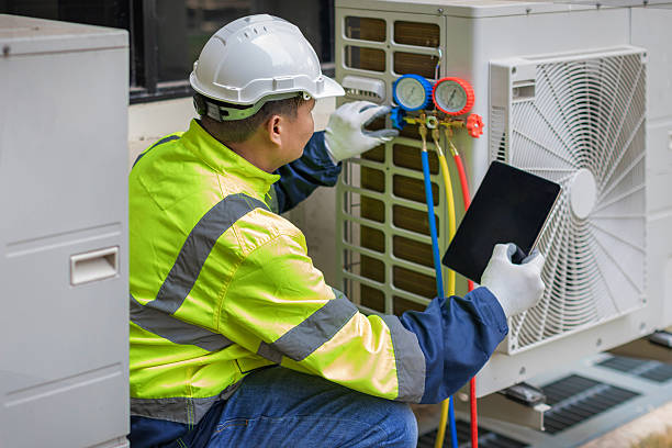 Professional Heat Pump Repair technician working in Lebanon, VA